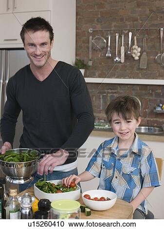 Father and Son Preparing Salad View Large Photo Image Stock Image - Father and Son Preparing Salad. Fotosearch