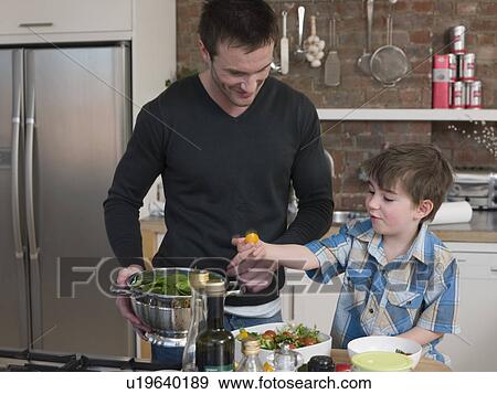 Father and Son Preparing Salad View Large Photo Image Stock Photo - Father and Son Preparing Salad. Fotosearch