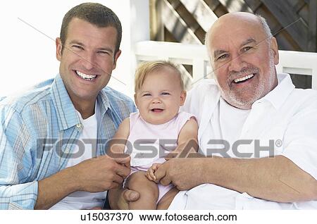 Stock Image - Father, Son and Granddaughter on porch. Fotosearch