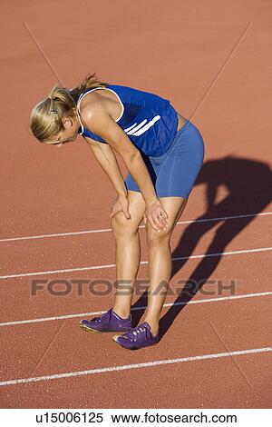 Female athlete after completed run View Large Photo Image Stock Photography - Female athlete after completed run. Fotosearch