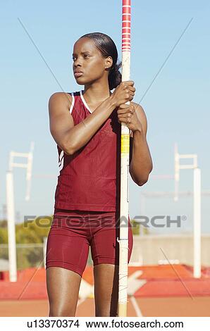 Female athlete with pole vault View Large Photo Image Picture - Female athlete with pole vault. Fotosearch