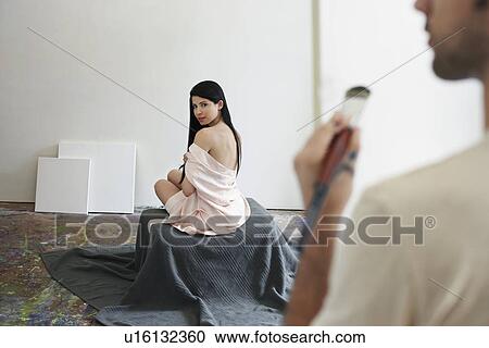 Female model posing for artist in studio, back view View Large Photo Image Stock Image - Female model posing for artist in studio, back view. Fotosearch