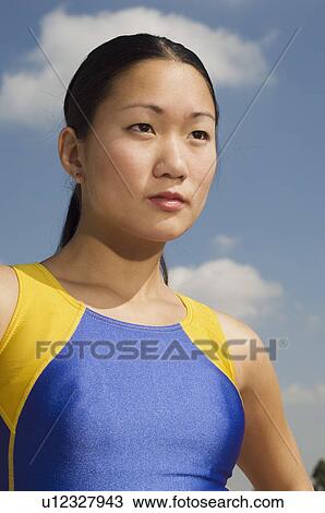 Stock Image - Female track athlete. Fotosearch