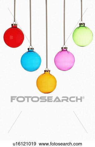Five Christmas baubles on white background View Large Photo Image Stock Photo - Five Christmas baubles on white background. Fotosearch