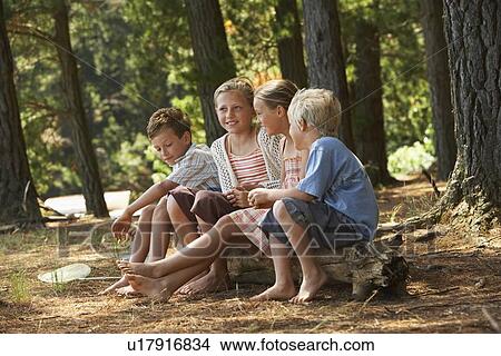 Picture - Four Children in Forest. Fotosearch