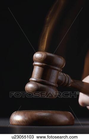 Gavel hitting base, black background View Large Photo Image Stock Image - Gavel hitting base, black background. Fotosearch