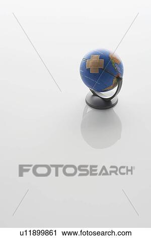 Stock Image - Globe With Bandaid. Fotosearch