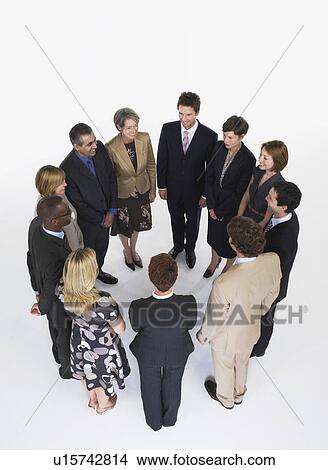 Group of Businesspeople in a circle View Large Photo Image Picture - Group of Businesspeople in a circle. Fotosearch