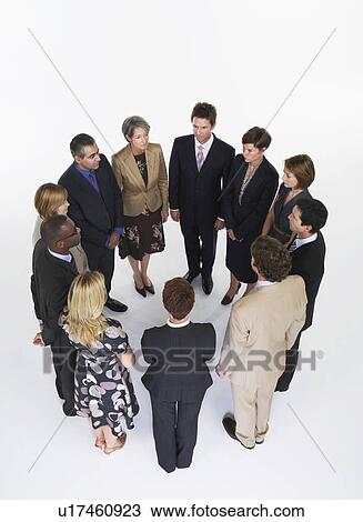 Group of Businesspeople in a circle View Large Photo Image Stock Image - Group of Businesspeople in a circle. Fotosearch