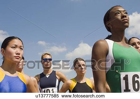 Stock Photography - Group of female track athletes. Fotosearch