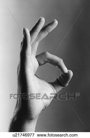 Stock Photo - Hand showing okay gesture, (b&w), (close-up). Fotosearch