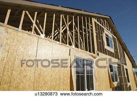 Stock Image - House construction. Fotosearch