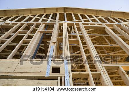 Incomplete house on construction site View Large Photo Image Picture - Incomplete house on construction site. Fotosearch