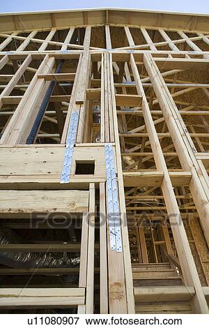Incomplete house on construction site View Large Photo Image Stock Photo - Incomplete house on construction site. Fotosearch