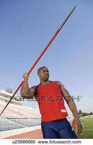 Stock Image - Javelin throwing. Fotosearch