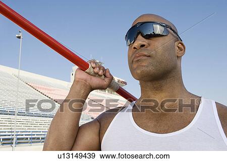 Javelin throwing View Large Photo Image Stock Photo - Javelin throwing. Fotosearch