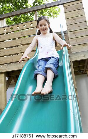 Stock Image - Little going down slide. Fotosearch
