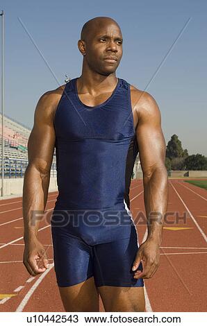 Male athlete at stadium View Large Photo Image Stock Image - Male athlete at stadium. Fotosearch