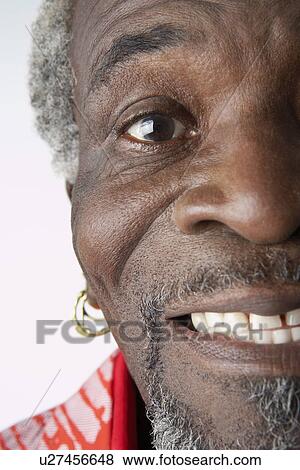 Stock Photo - Man looking into camera, with open mouth. Fotosearch