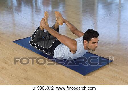 Man Practicing Yoga View Large Photo Image Stock Image - Man Practicing Yoga. Fotosearch