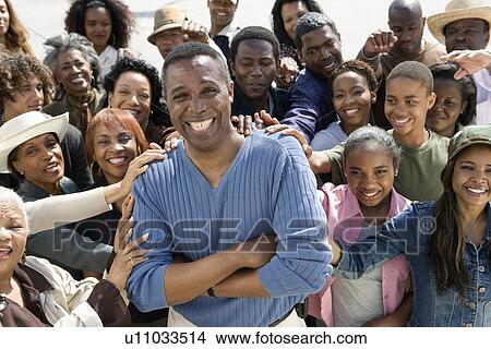 Man surrounded by crowd View Large Photo Image Picture - Man surrounded by crowd. Fotosearch