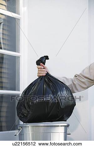 Man Taking Garbage Out of Can View Large Photo Image Stock Image - Man Taking Garbage Out of Can. Fotosearch