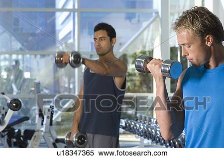Men Weightlifting With Dumbbells View Large Photo Image Stock Photography - Men Weightlifting With Dumbbells. Fotosearch