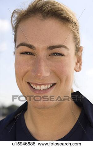 Mid-adult woman smiling, portrait View Large Photo Image Stock Photograph - Mid-adult woman smiling, portrait. Fotosearch