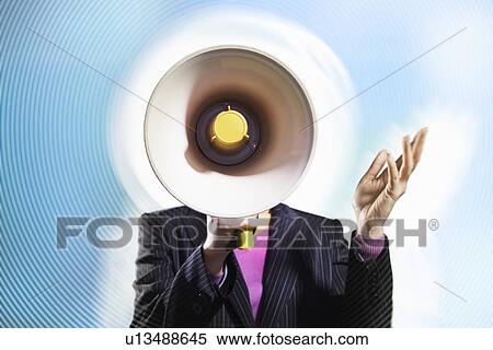 Stock Photography - Mid-adult woman speaking through megaphone, arms raised, digitally enhanced. Fotosearch