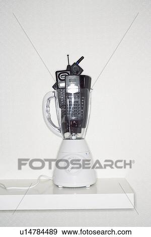 Mobile phones in electric blender View Large Photo Image Stock Photo - Mobile phones in electric blender. Fotosearch