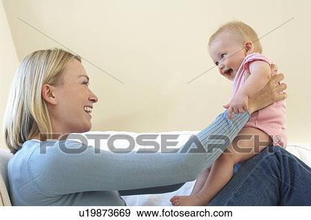 Mother and Baby Playing View Large Photo Image Stock Photo - Mother and Baby Playing. Fotosearch
