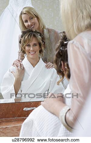 Mother and daughter in mirror, portrait View Large Photo Image Stock Image - Mother and daughter in mirror, portrait. Fotosearch