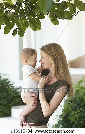 Mother and son, half length View Large Photo Image Picture - Mother and son, half length. Fotosearch