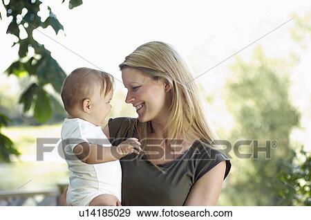 Stock Photo - Mother and son, head and shoulders. Fotosearch