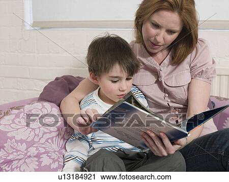 Mother Reading to Son View Large Photo Image Stock Image - Mother Reading to Son. Fotosearch
