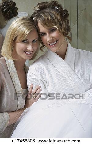 Mother talking to daughter in bathrobe, portrait View Large Photo Image Stock Photograph - Mother talking to daughter in bathrobe, portrait. Fotosearch