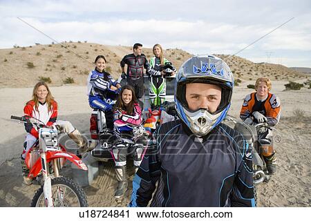 Motocross racers in desert, (portrait) View Large Photo Image Stock Image - Motocross racers in desert, (portrait). Fotosearch