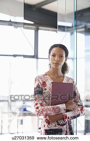 Stock Photo - Office Worker Carrying File Folder. Fotosearch
