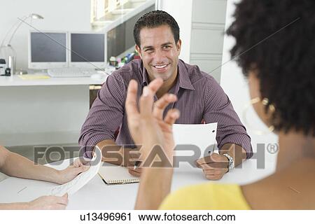 Office workers having conference View Large Photo Image Stock Image - Office workers having conference. Fotosearch