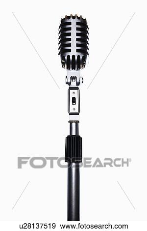 Stock Photo - Old fashioned microphone in studio. Fotosearch