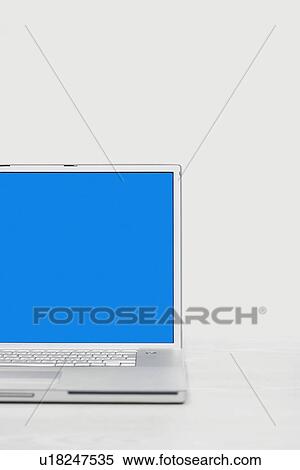 Open laptop on desk, cropped View Large Photo Image Stock Photography - Open laptop on desk, cropped. Fotosearch