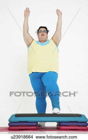 Picture - Overweight Woman Doing Gymnastics. Fotosearch