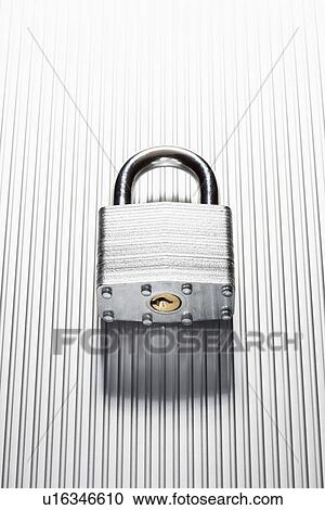 Padlock on metal surface View Large Photo Image Stock Image - Padlock on metal surface. Fotosearch