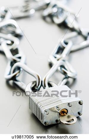 Stock Photography - Padlock with key and chain. Fotosearch