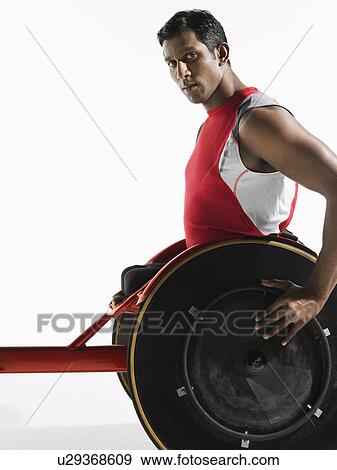 Stock Photo - Paraplegic cycler, side view. Fotosearch