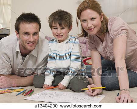 Parents on Floor Coloring With Son View Large Photo Image Stock Image - Parents on Floor Coloring With Son. Fotosearch
