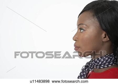 Pensive woman wearing scarf, close-up, profile View Large Photo Image Stock Photo - Pensive woman wearing scarf, close-up, profile. Fotosearch