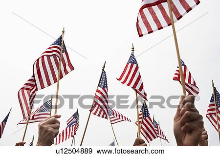 People holding up American Flags, High Section View Large Photo Image Stock Photo - People holding up American Flags, High Section. Fotosearch