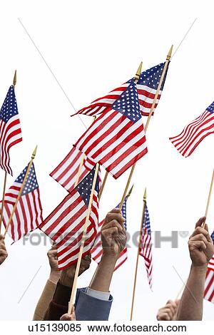 People holding up American Flags, High Section View Large Photo Image Stock Photography - People holding up American Flags, High Section. Fotosearch