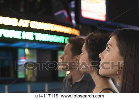 People Waiting in Line at Theatre, at night View Large Photo Image Stock Photo - People Waiting in Line at Theatre, at night. Fotosearch